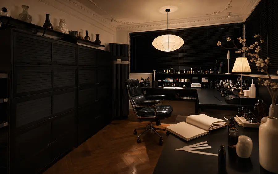 Evening fragrance studio with warm lamps and materials